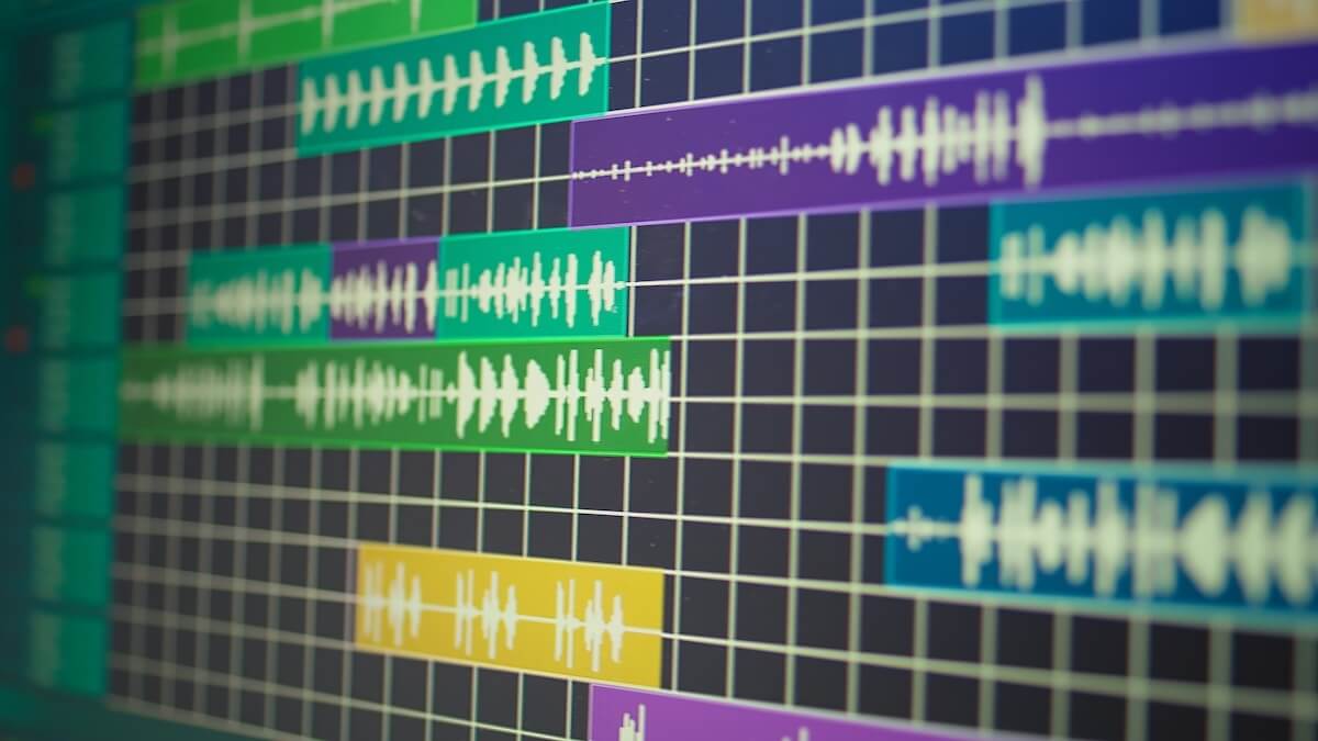 Colorful audio waveforms arranged on a multitrack editing timeline.