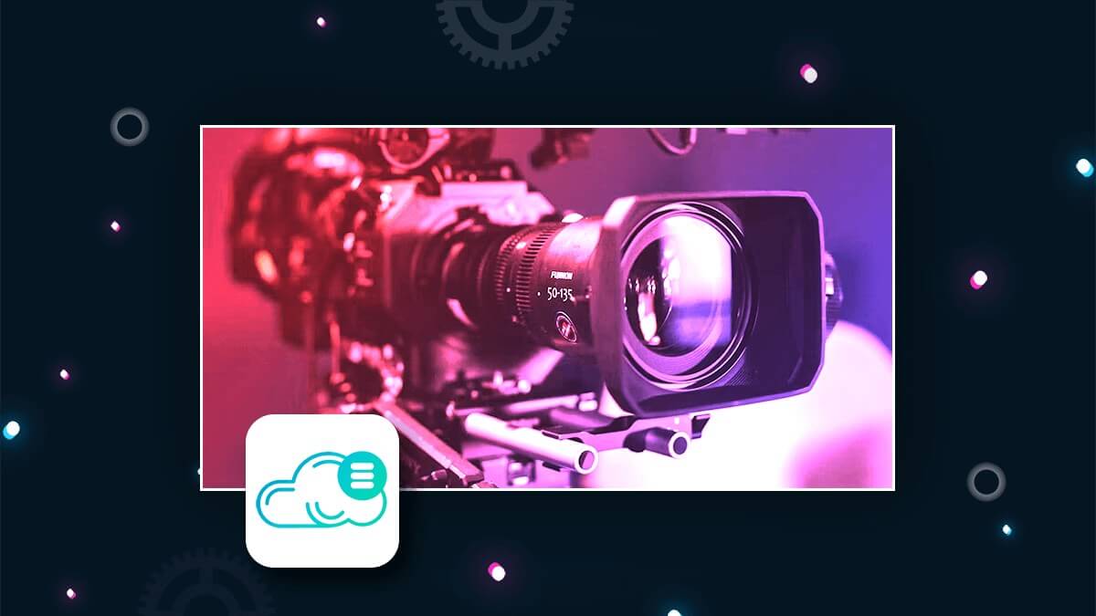 Close-up of a video camera lit in pink and purple, with a cloud icon in the corner.