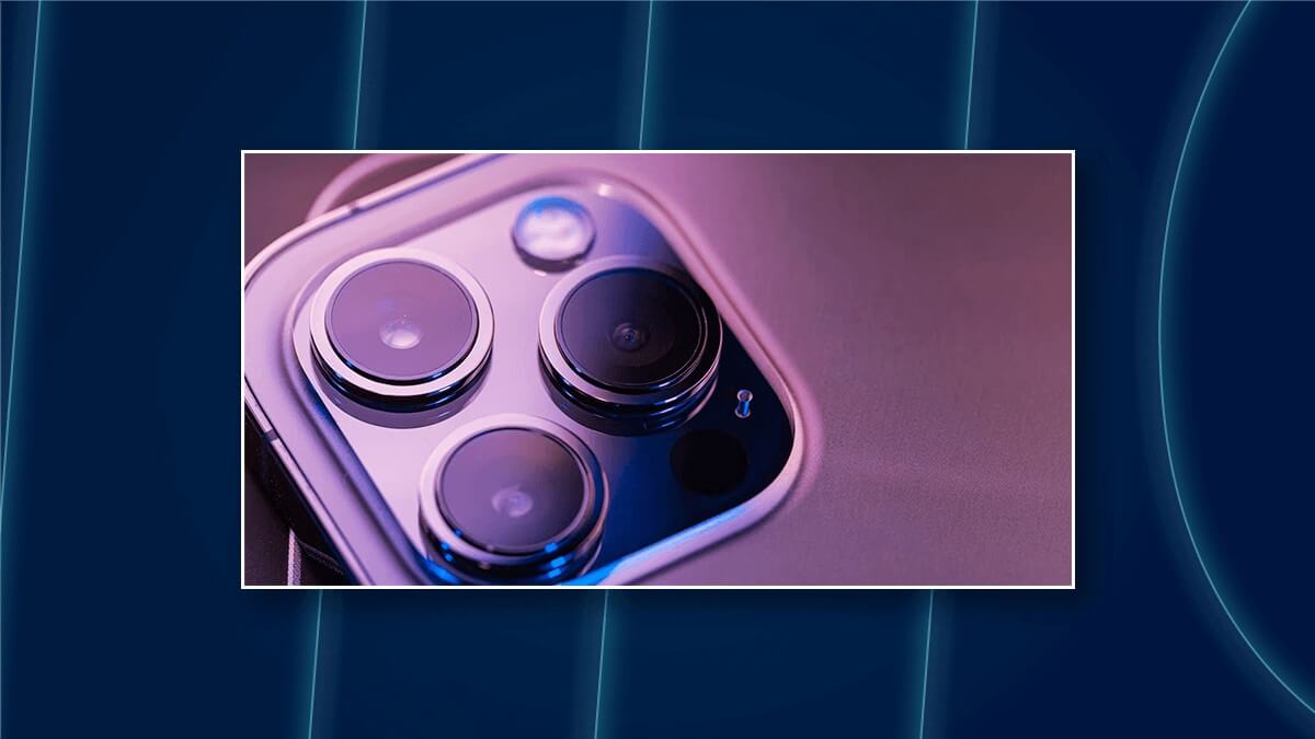 Close-up of a smartphone’s triple-lens rear camera module.