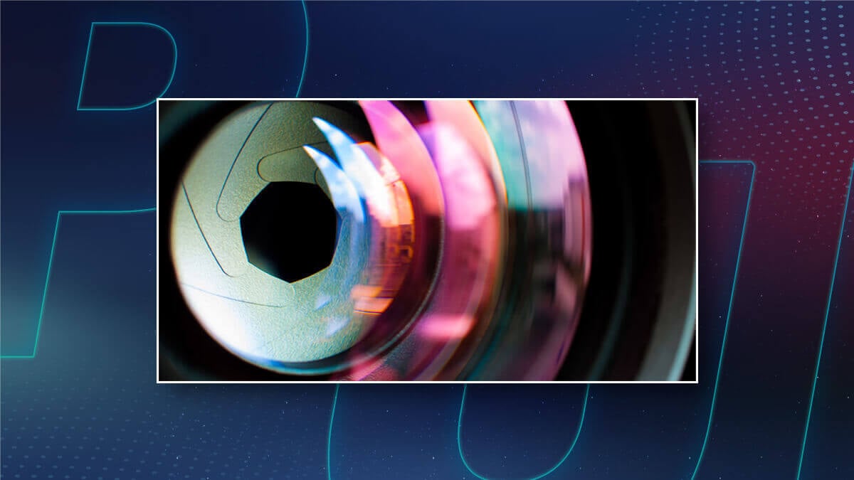 Close-up of a camera lens aperture with colorful reflections, framed on a dark graphic background.