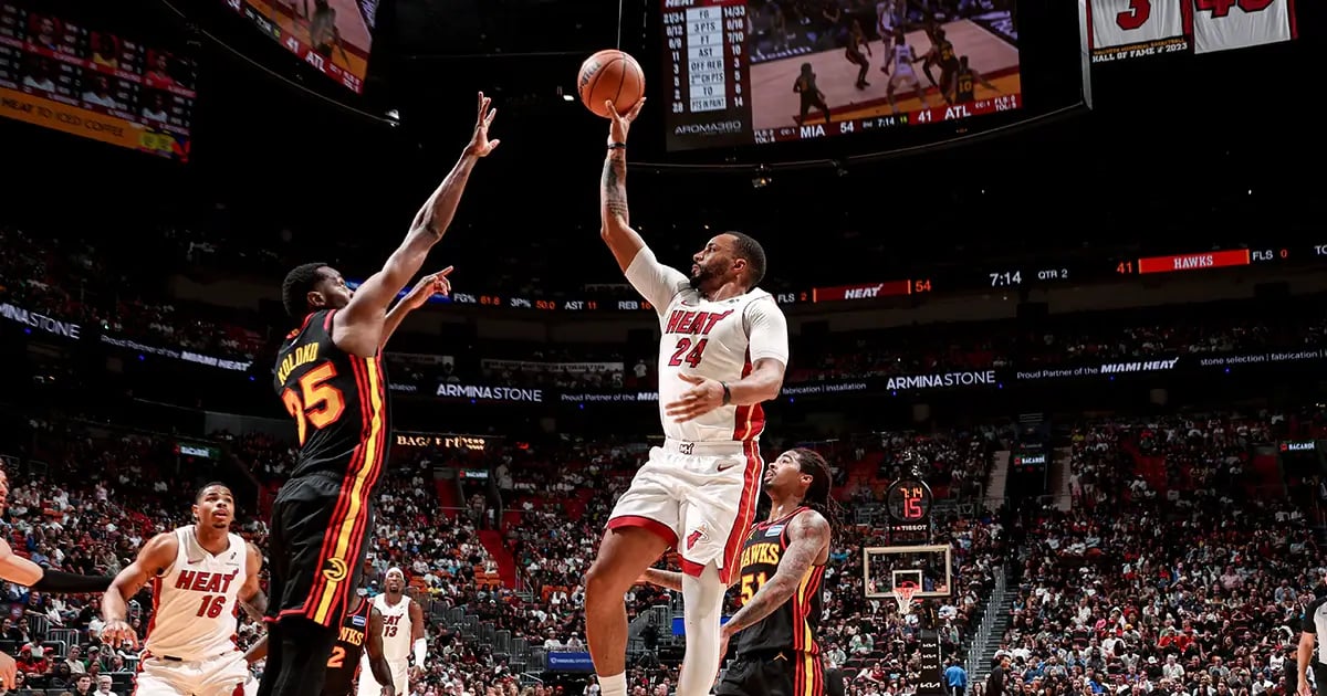 Miami Heat game. Two players jumping.
