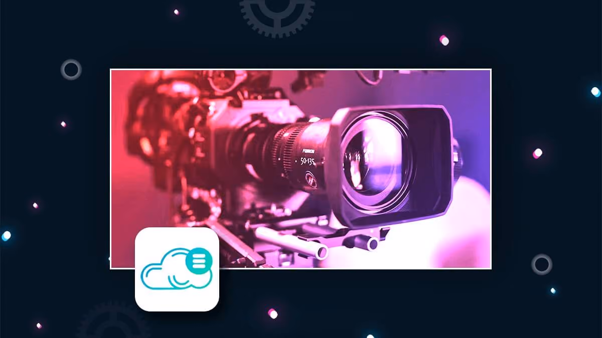 Close-up of a video camera lit in pink and purple, with a cloud icon in the corner.